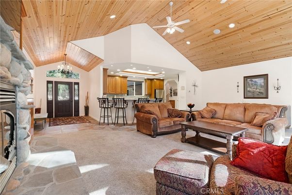 Chandelier, Fireplace, Interior, Kitchen, Living room, Recessed Lighting, Wooden Ceilings