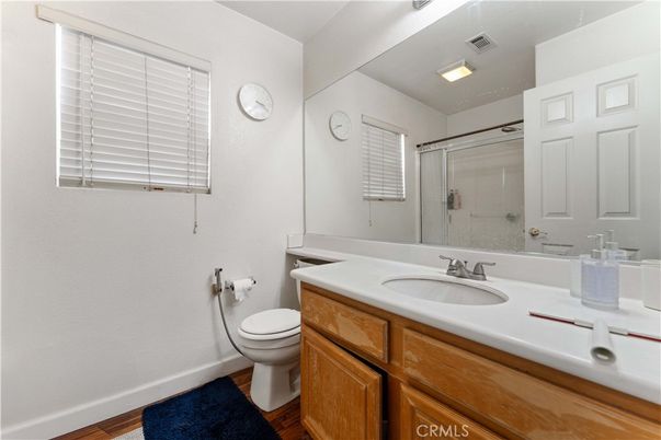 Bathroom, Dual Sink Vanities, Glass Shower, Interior, Wood Texture Flooring