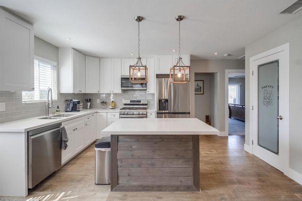 Interior, Kitchen, Pendant Lights, Recessed Lighting, Stainless Steel Appliances, Wood Texture Flooring