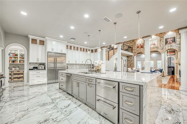 Interior, Kitchen, Marble, Pendant Lights, Recessed Lighting, Stainless Steel Appliances, Stone Walls