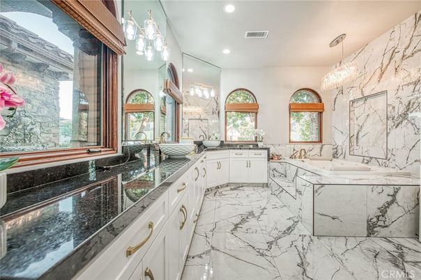 Bathroom, Chandelier, Dual Sink Vanities, Glass Shower, Interior, Marble, Marble Walls, Recessed Lighting