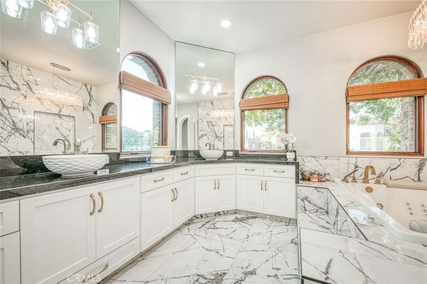 Bathroom, Dual Sink Vanities, Interior, Marble, Marble Walls, Recessed Lighting