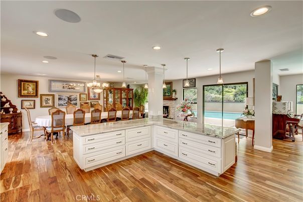 Chandelier, Dining room, Fireplace, Interior, Kitchen, Pendant Lights, Recessed Lighting, Wood Texture Flooring