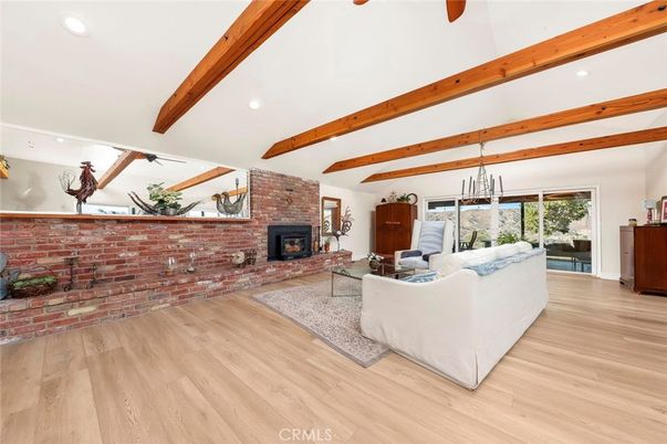 Dining room, Fireplace, Interior, Living room, Pendant Lights, Recessed Lighting, Stone Walls, Wooden Beams, Wood Texture Flooring