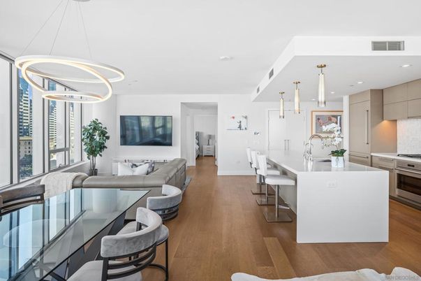 Dining room, Interior, Kitchen, Living room, Pendant Lights, Recessed Lighting, Stainless Steel Appliances, Wood Texture Flooring