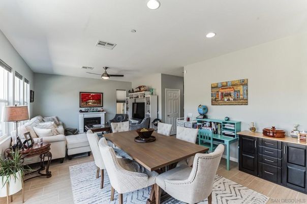 Dining room, Fireplace, Interior, Living room, Recessed Lighting, Wood Texture Flooring