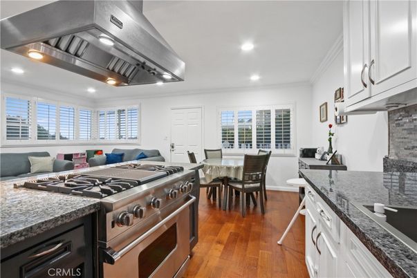 Dining room, Interior, Kitchen, Recessed Lighting, Stainless Steel Appliances, Wood Texture Flooring