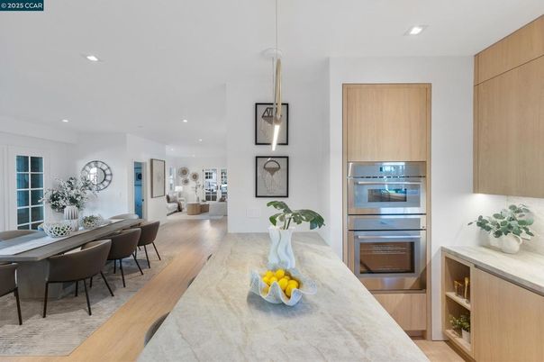 Dining room, Interior, Kitchen, Pendant Lights, Recessed Lighting, Stainless Steel Appliances, Wood Texture Flooring
