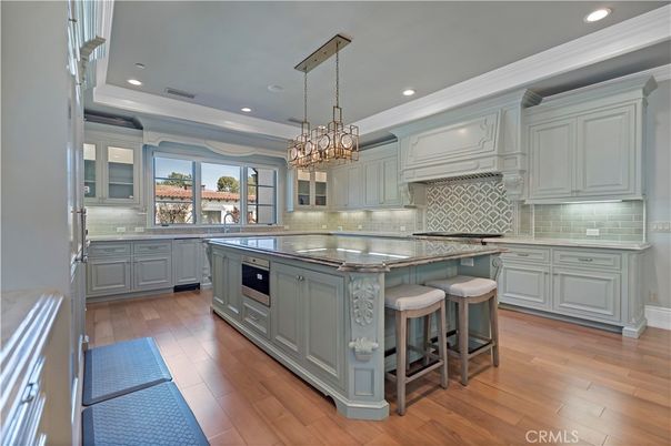 Chandelier, Interior, Kitchen, Pendant Lights, Recessed Lighting, Stainless Steel Appliances, Wood Texture Flooring