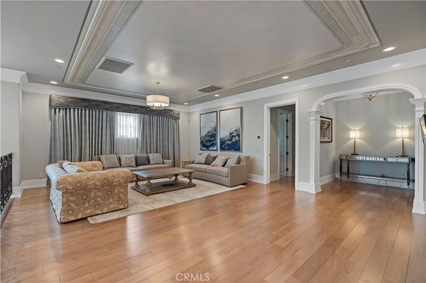 Chandelier, Fireplace, Interior, Living room, Recessed Lighting, Wood Texture Flooring