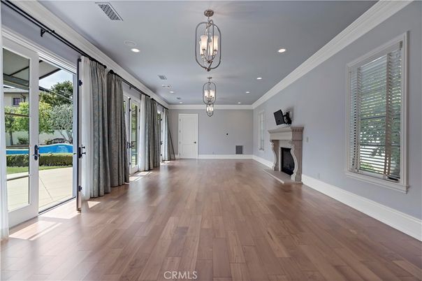 Empty room, Fireplace, Interior, Pendant Lights, Recessed Lighting, Wood Texture Flooring