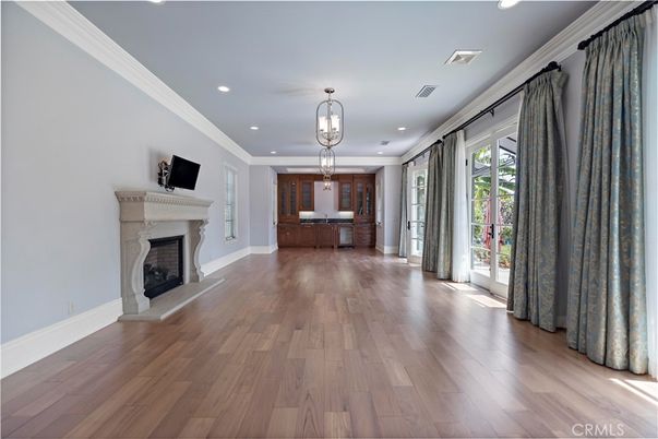 Fireplace, Interior, Pendant Lights, Recessed Lighting, Wood Texture Flooring