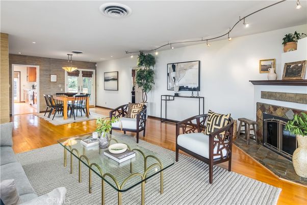 Dining room, Fireplace, Interior, Living room, Pendant Lights, Recessed Lighting, Wood Texture Flooring