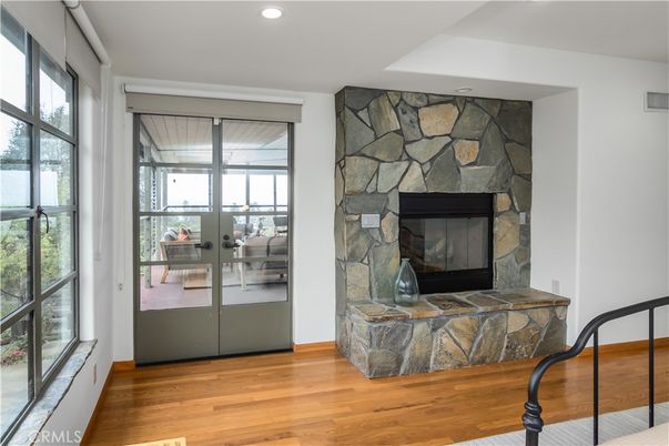 Fireplace, Interior, Recessed Lighting, Stone Walls, Wood Texture Flooring