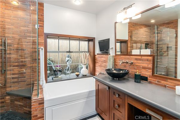 Bathroom, Dual Sink Vanities, Glass Shower, Interior, Recessed Lighting, Stone Walls