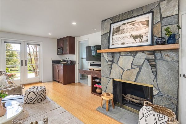 Fireplace, Interior, Kitchen, Recessed Lighting, Stone Walls, Wood Texture Flooring