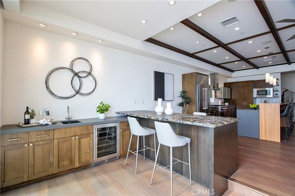 Chandelier, Interior, Kitchen, Recessed Lighting, Stainless Steel Appliances, Wood Texture Flooring