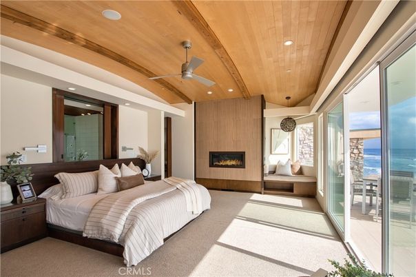 Bedroom, Fireplace, Interior, Recessed Lighting, Water, Wooden Ceilings