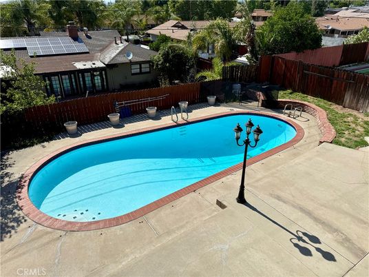 Exterior, Pool, Solar Panels