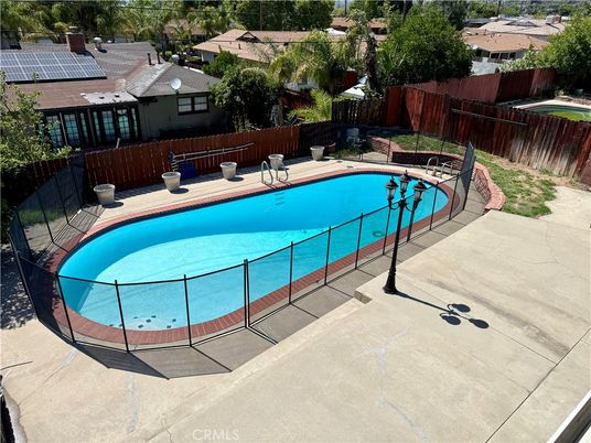 Exterior, Pool, Solar Panels