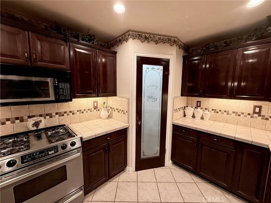 Interior, Kitchen, Recessed Lighting, Tile Countertops