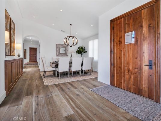 Chandelier, Dining room, Interior, Pendant Lights, Recessed Lighting, Wood Texture Flooring, Wooden Walls