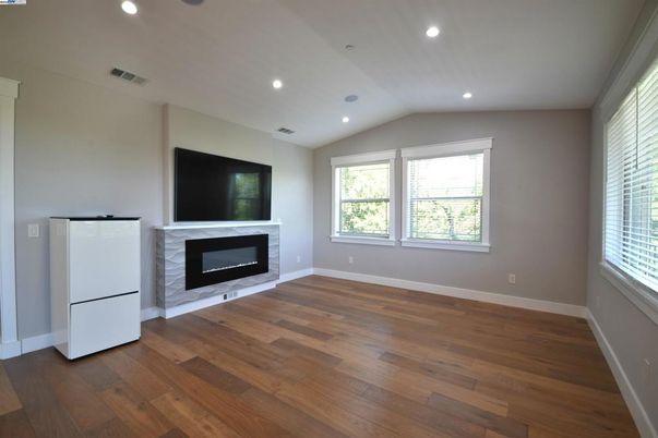Empty room, Fireplace, Interior, Recessed Lighting, Wood Texture Flooring