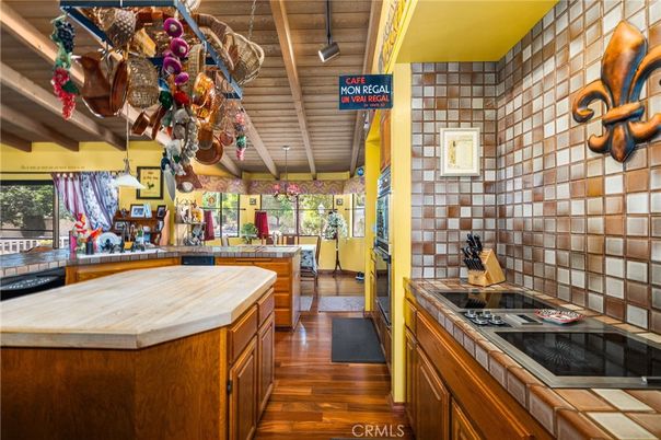Interior, Kitchen, Stone Walls, Tile Countertops, Wood Texture Flooring