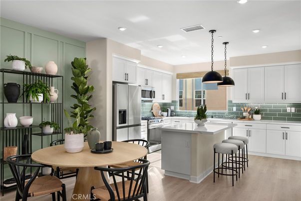 Dining room, Interior, Kitchen, Pendant Lights, Recessed Lighting, Stainless Steel Appliances, Wood Texture Flooring