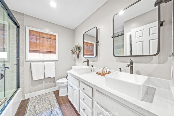Bathroom, Dual Sink Vanities, Interior, Recessed Lighting, Wood Texture Flooring