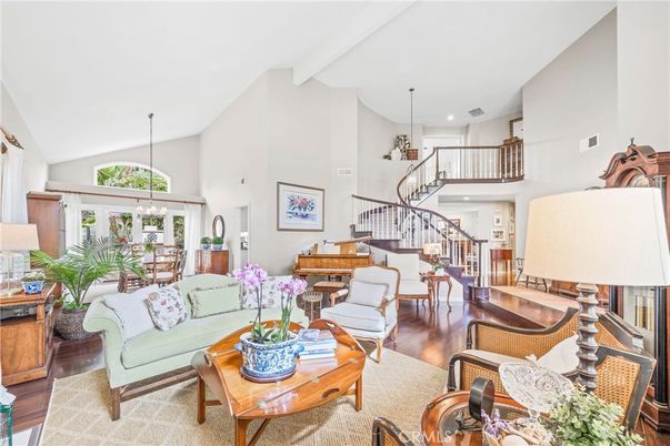 Chandelier, Dining room, Interior, Living room, Pendant Lights, Piano, Recessed Lighting, Wood Texture Flooring