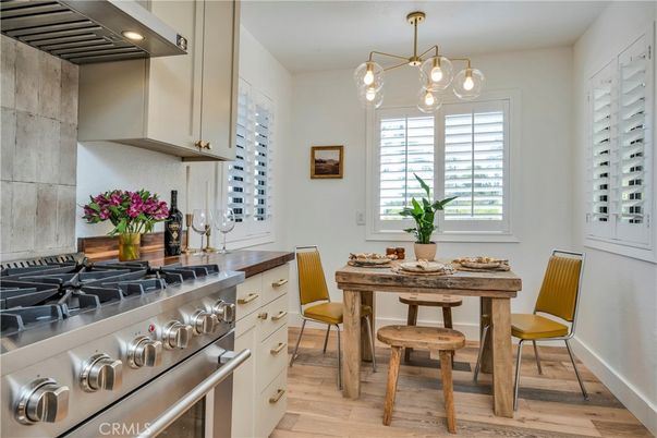 Dining room, Interior, Kitchen, Pendant Lights, Stainless Steel Appliances, Wood Texture Flooring