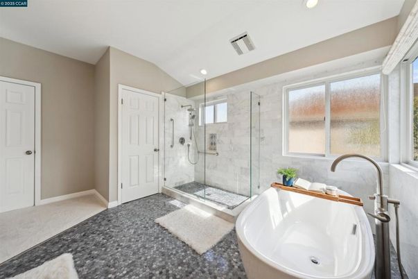 Bathroom, Free Standing Baths, Glass Shower, Interior, Marble Walls, Recessed Lighting