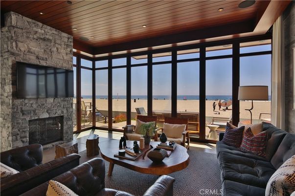 Fireplace, Interior, Living room, Recessed Lighting, Stone Walls, Water, Wooden Ceilings