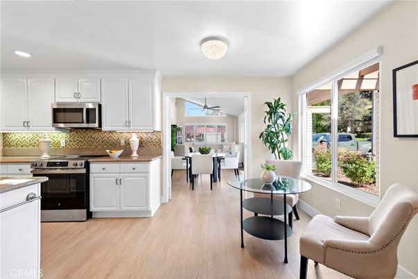 Dining room, Interior, Kitchen, Recessed Lighting, Stainless Steel Appliances, Wood Texture Flooring