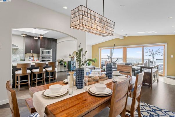 Chandelier, Dining room, Interior, Kitchen, Pendant Lights, Recessed Lighting, Stainless Steel Appliances, Wood Texture Flooring