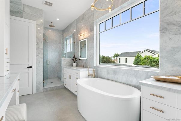 Bathroom, Dual Sink Vanities, Free Standing Baths, Glass Shower, Interior, Marble Walls, Recessed Lighting