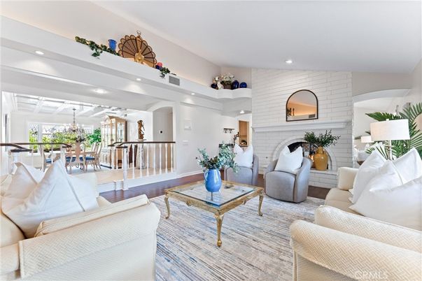 Chandelier, Dining room, Fireplace, Interior, Living room, Recessed Lighting, Stone Walls, Wood Texture Flooring