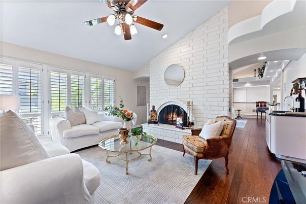 Fireplace, Interior, Living room, Recessed Lighting, Stone Walls, Wood Texture Flooring