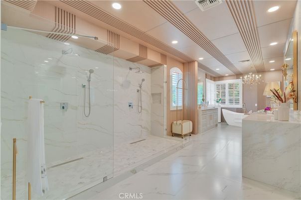 Bathroom, Chandelier, Free Standing Baths, Glass Shower, Interior, Marble, Marble Walls, Recessed Lighting