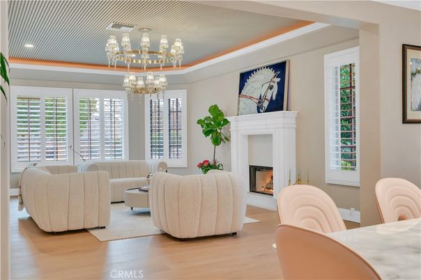 Chandelier, Fireplace, Interior, Living room, Pendant Lights, Recessed Lighting, Wood Texture Flooring