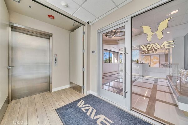 Elevator, Interior, Recessed Lighting, Wood Texture Flooring