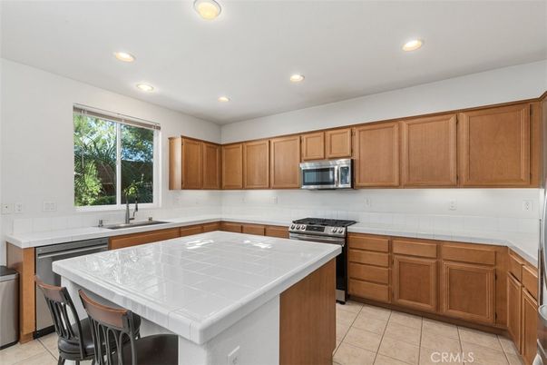 Interior, Kitchen, Recessed Lighting, Stainless Steel Appliances, Tile Countertops