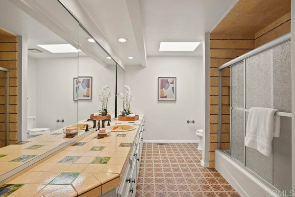 Bathroom, Dual Sink Vanities, Glass Shower, Interior, Recessed Lighting, Tile Countertops