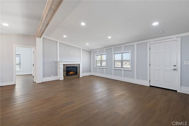 Empty room, Fireplace, Interior, Recessed Lighting, Wooden Beams, Wood Texture Flooring