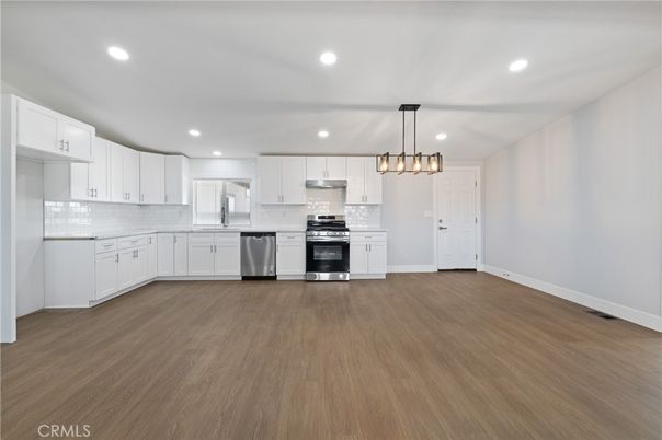 Interior, Kitchen, Pendant Lights, Recessed Lighting, Stainless Steel Appliances, Wood Texture Flooring