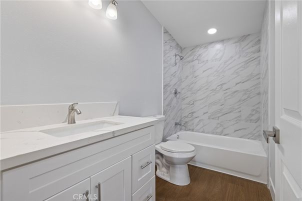 Bathroom, Interior, Marble Walls, Recessed Lighting, Wood Texture Flooring