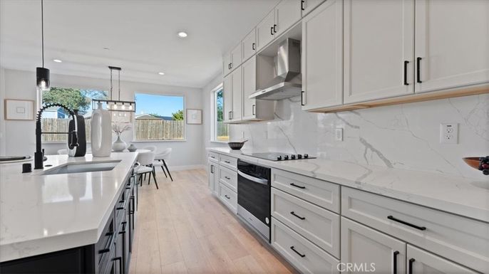 Dining room, Interior, Kitchen, Marble Walls, Pendant Lights, Recessed Lighting, Wood Texture Flooring