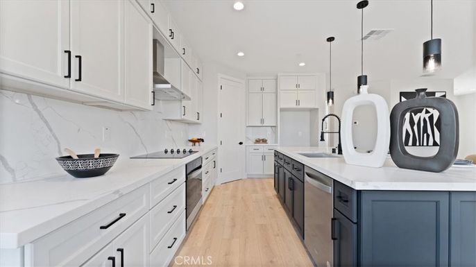 Interior, Kitchen, Marble Walls, Pendant Lights, Recessed Lighting, Wood Texture Flooring