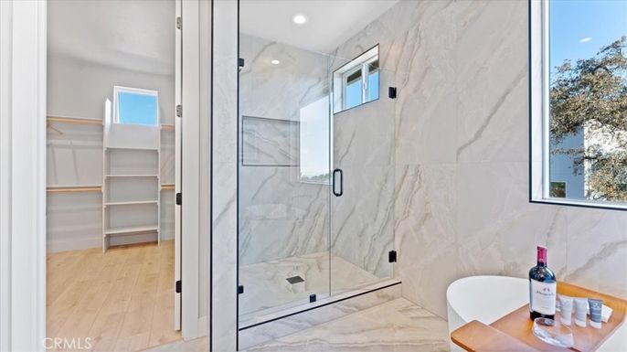 Bathroom, Glass Shower, Interior, Marble Walls, Recessed Lighting, Wood Texture Flooring